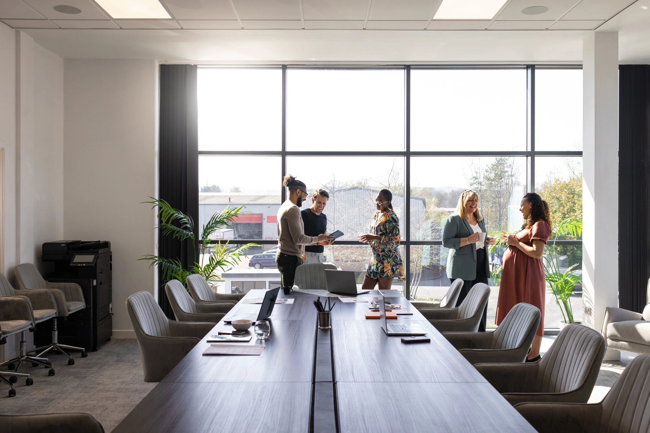 Professional team discussing plans in a modern office