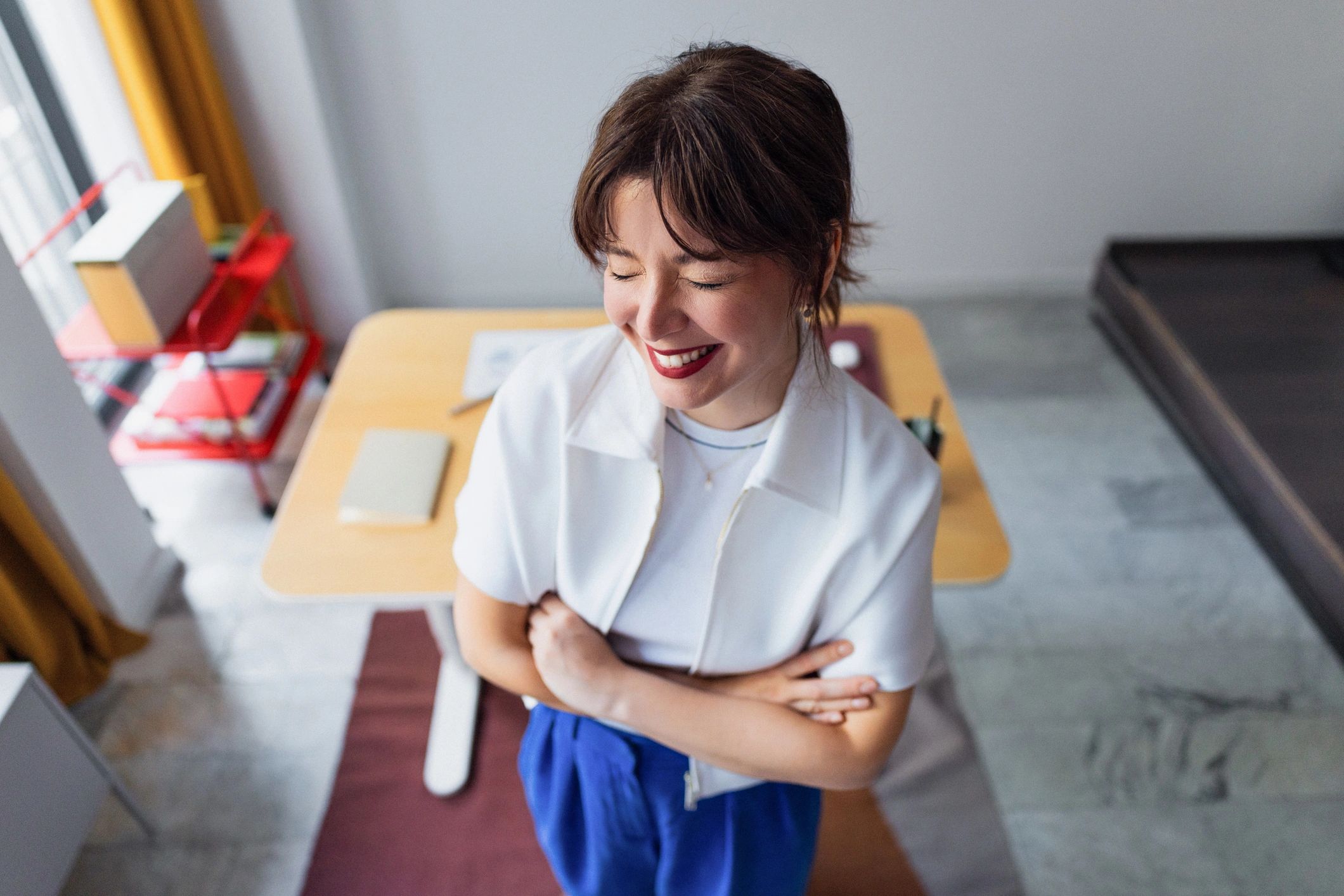 Professional consultant standing confidently in a bright office