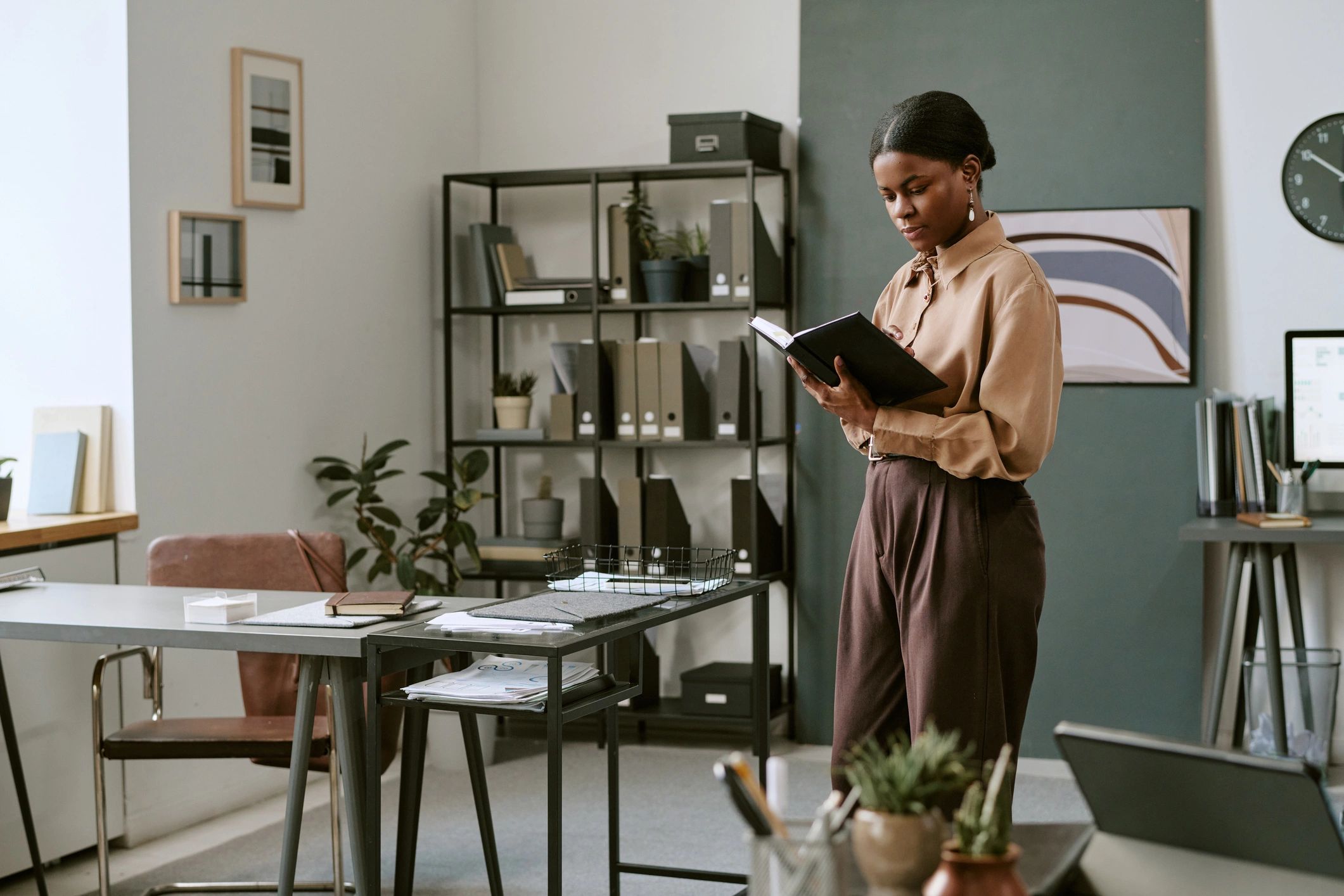 Business consultant reviewing documents in a modern office